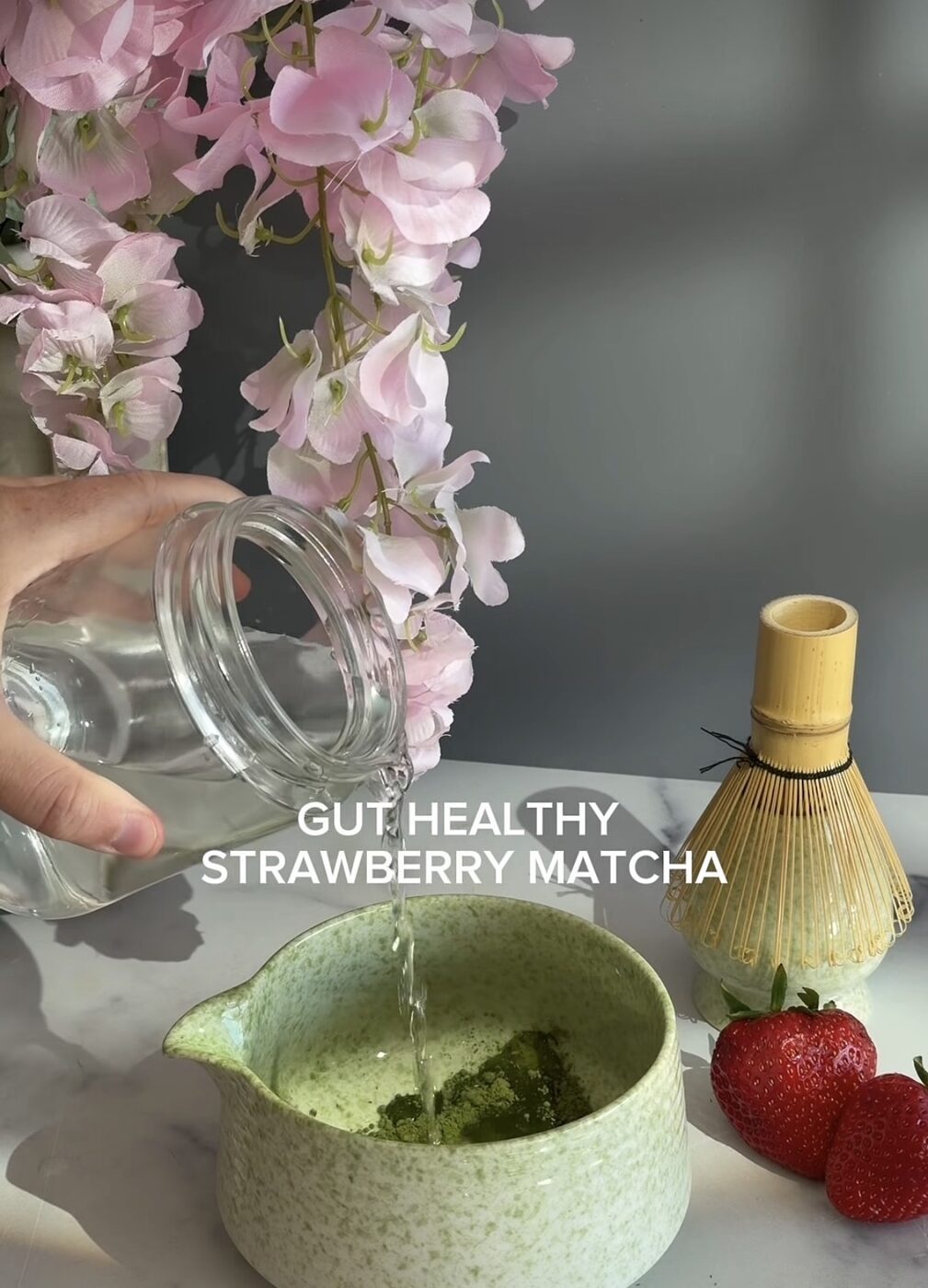 Strawberry matcha being poured