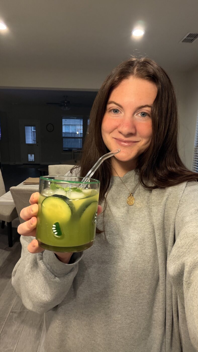 Caitlin with a cucumber mint drink