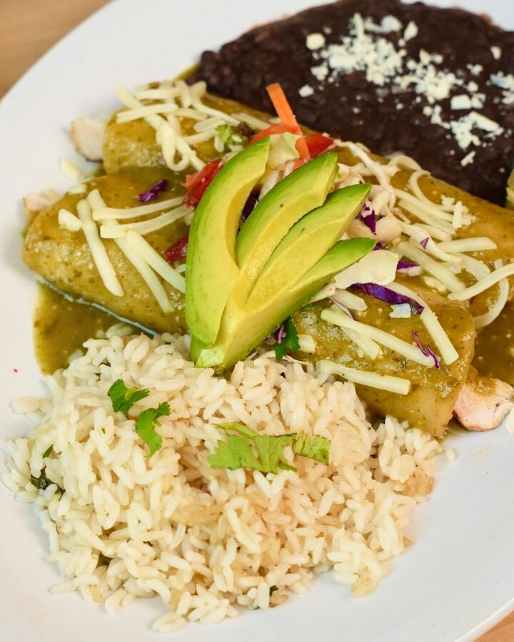 Green chile chicken enchiladas plate
