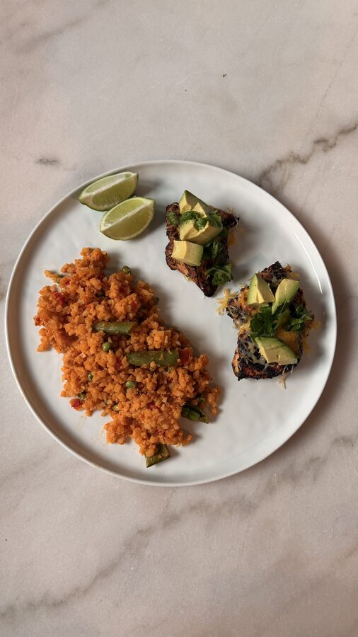 Cauliflower rice plate with grilled chicken and avocado